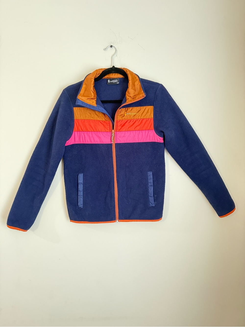 cotopaxi Navy Fleece Jacket with Orange and Pink Stripes